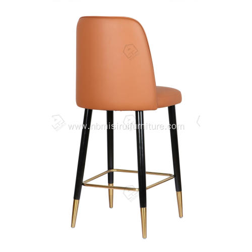 Orange faux leather bar stool